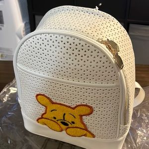 Never been used Winnie the Pooh backpack.